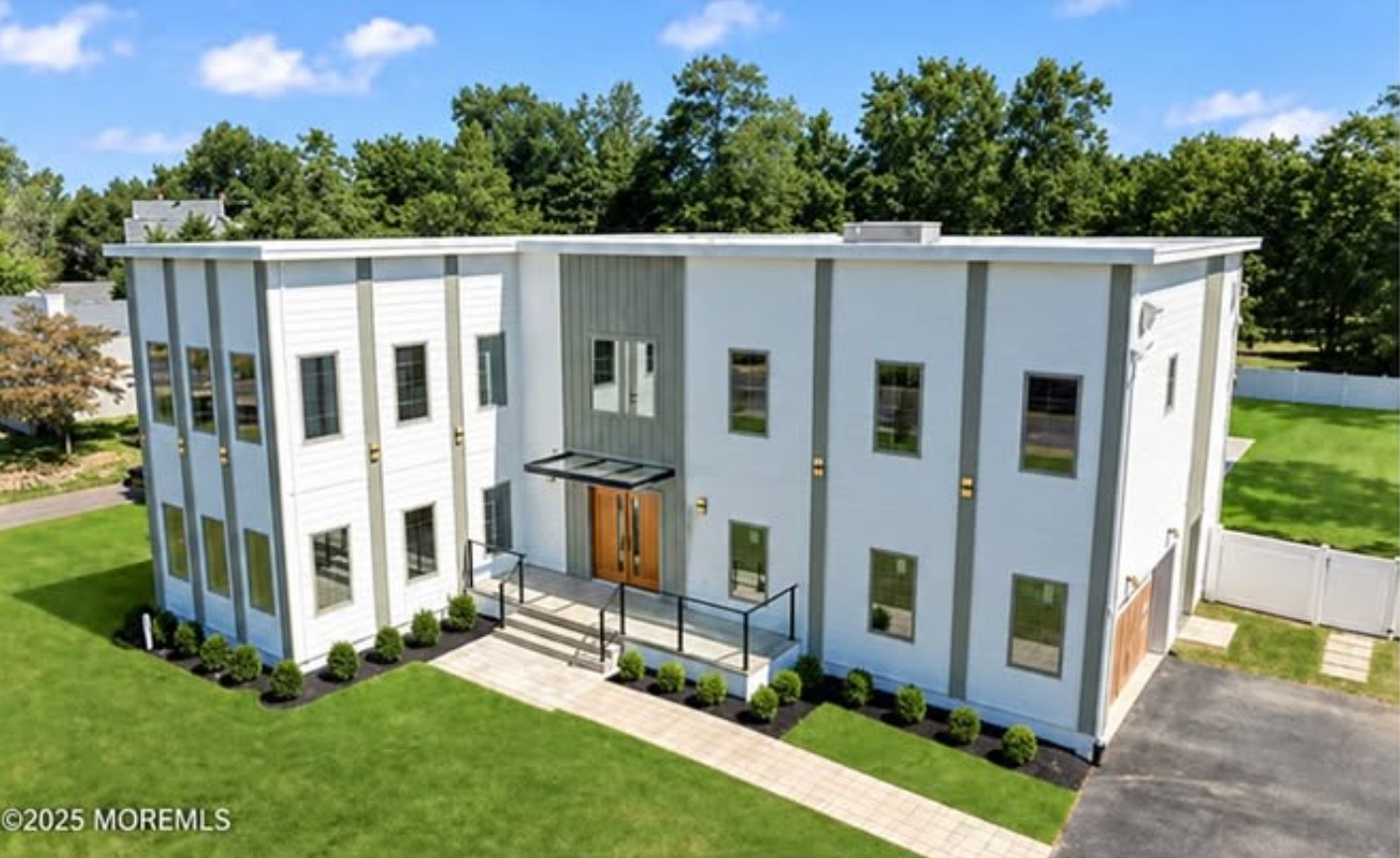 Advertiser-supplied exterior photograph of the modern home at 390 Monmouth Road, West Long Branch.